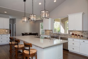 Wood Flooring, Quartz Countertops, White Shaker Cabinets, Kitchen Design & Remodeling in Gilbert, AZ