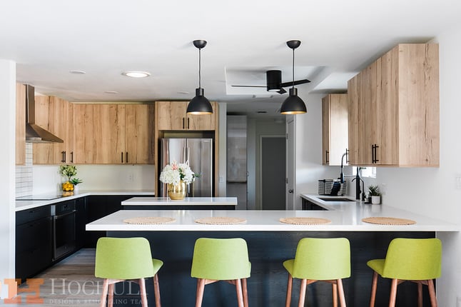 a modern kitchen addition in tempe arizona with wood cabinetry.
