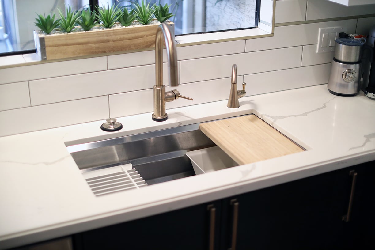 workstation sink with quartz countertop in this chandler az kitchen remodel